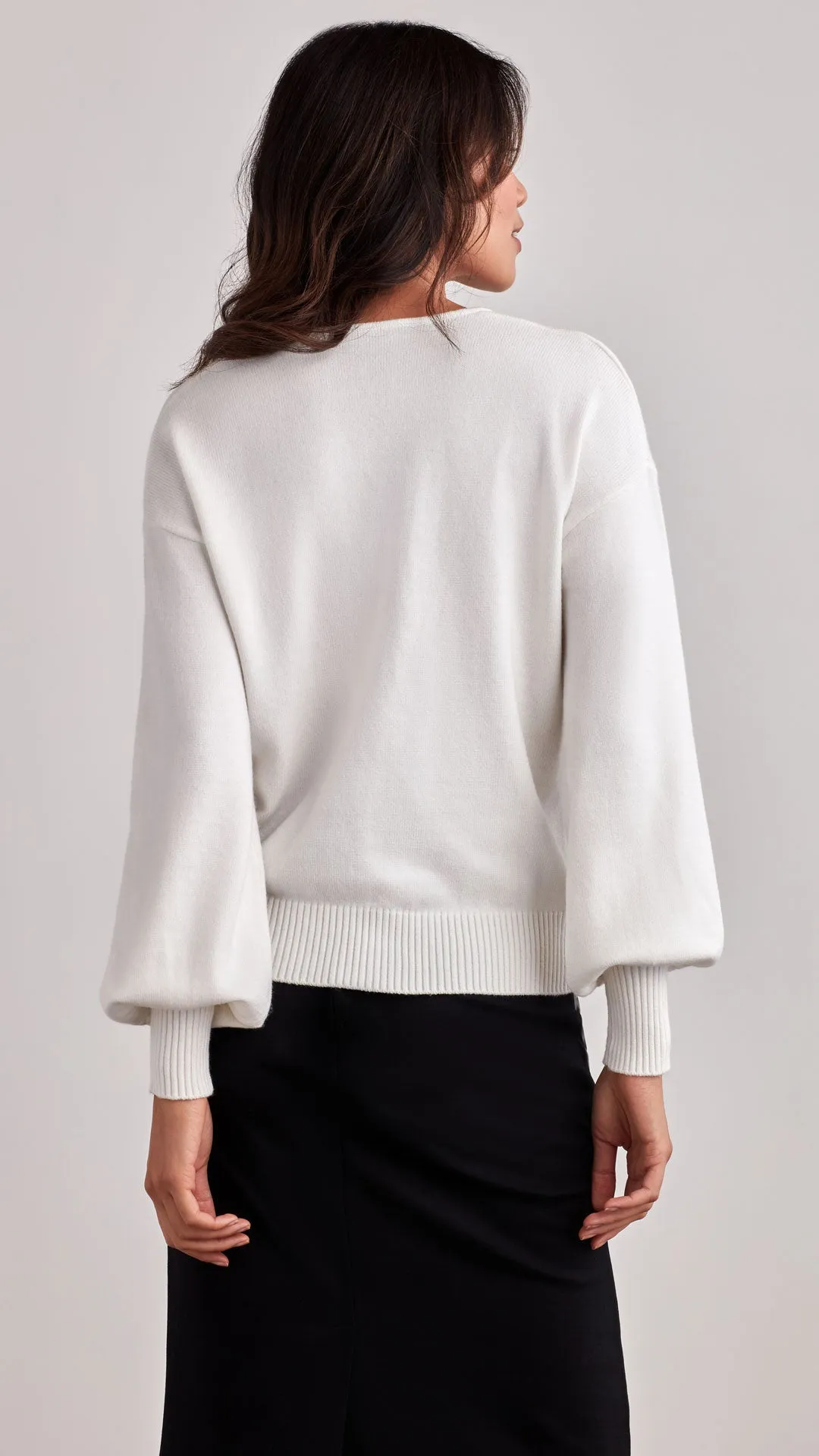 CABLE-KNIT SWEATER