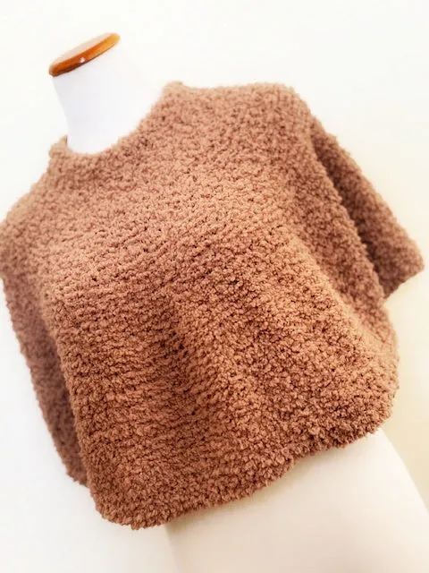 Fuzzy poncho, 25% off