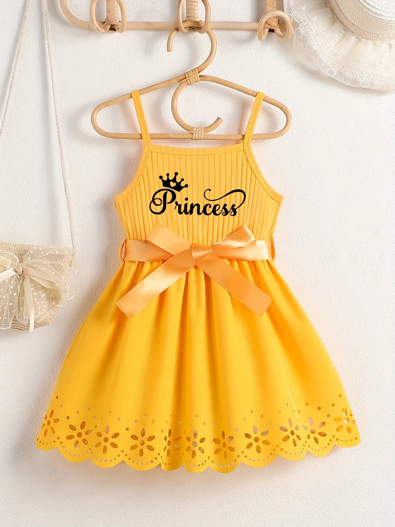 Girls Casual Summer Princess Alphabet Print Dress - Sleeveless Strappy Hollow Out Design, Bow Belt, Slight Stretch Polyester Fabric, Regular Fit, Knit Fabric, Perfect for Party Wear