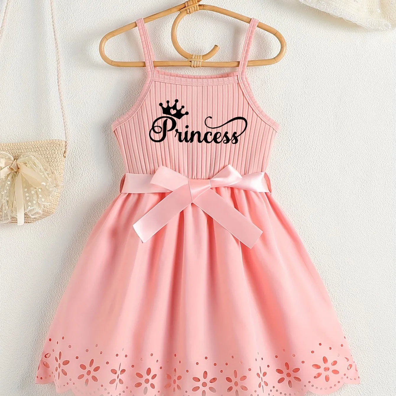 Girls Casual Summer Princess Alphabet Print Dress - Sleeveless Strappy Hollow Out Design, Bow Belt, Slight Stretch Polyester Fabric, Regular Fit, Knit Fabric, Perfect for Party Wear