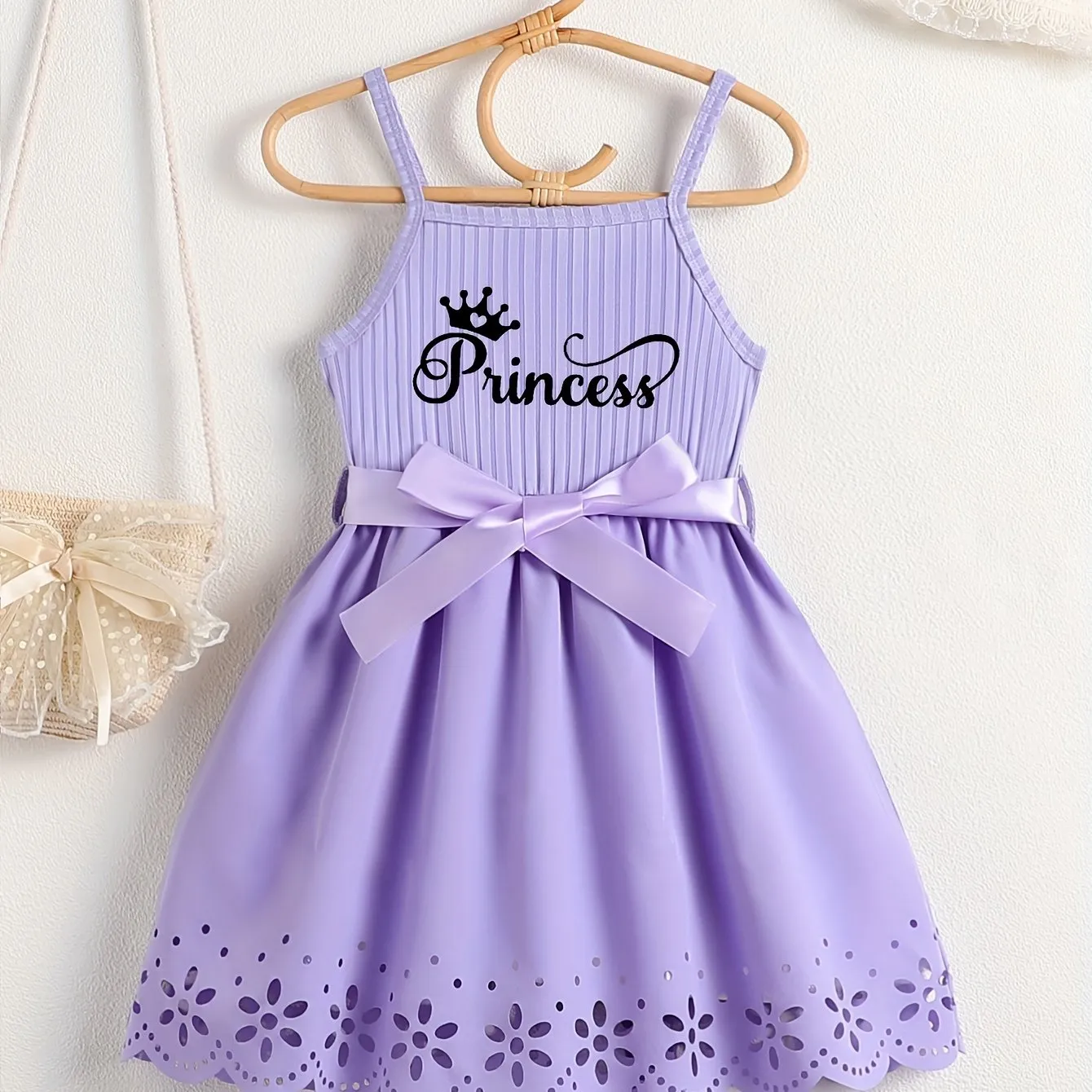 Girls Casual Summer Princess Alphabet Print Dress - Sleeveless Strappy Hollow Out Design, Bow Belt, Slight Stretch Polyester Fabric, Regular Fit, Knit Fabric, Perfect for Party Wear